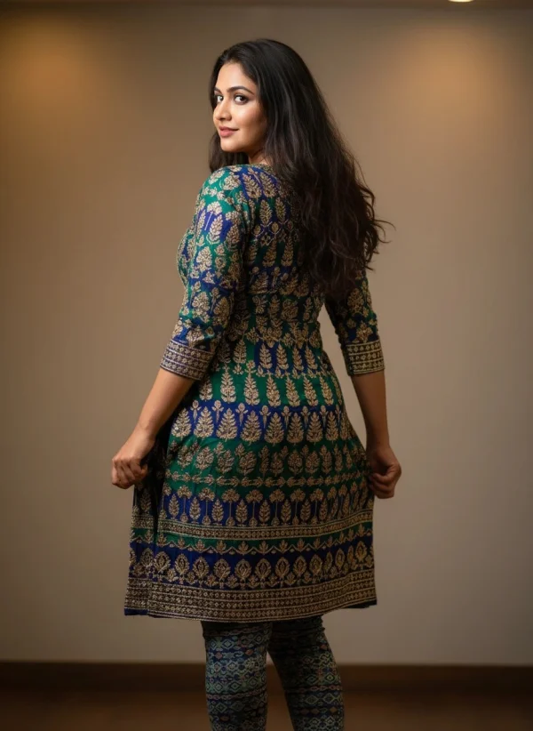 Elegant Indian Woman in Traditional Green and Gold Printed Kurta